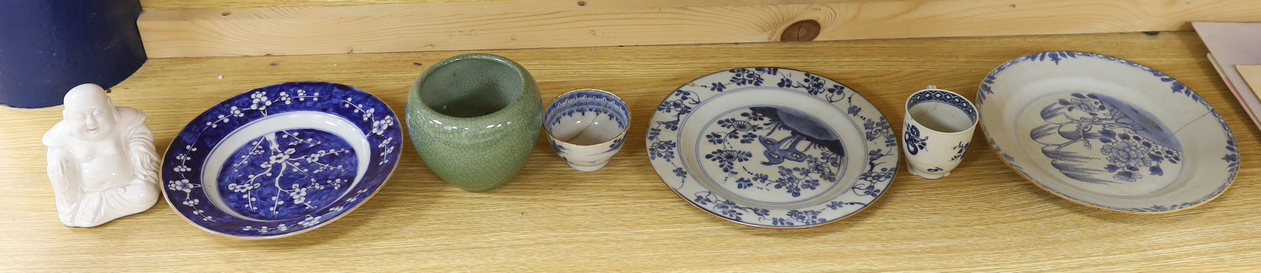 Two Chinese export plates, a prunus dish, tea bowl and cup, a crackleware bowl and a Buddha, widest plate 23cm diameter (7)